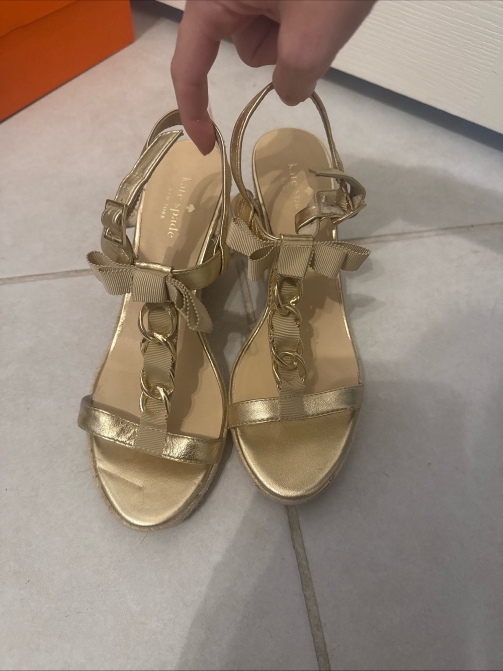 kate spade Metallic Gold Bow T-Strap Wedges